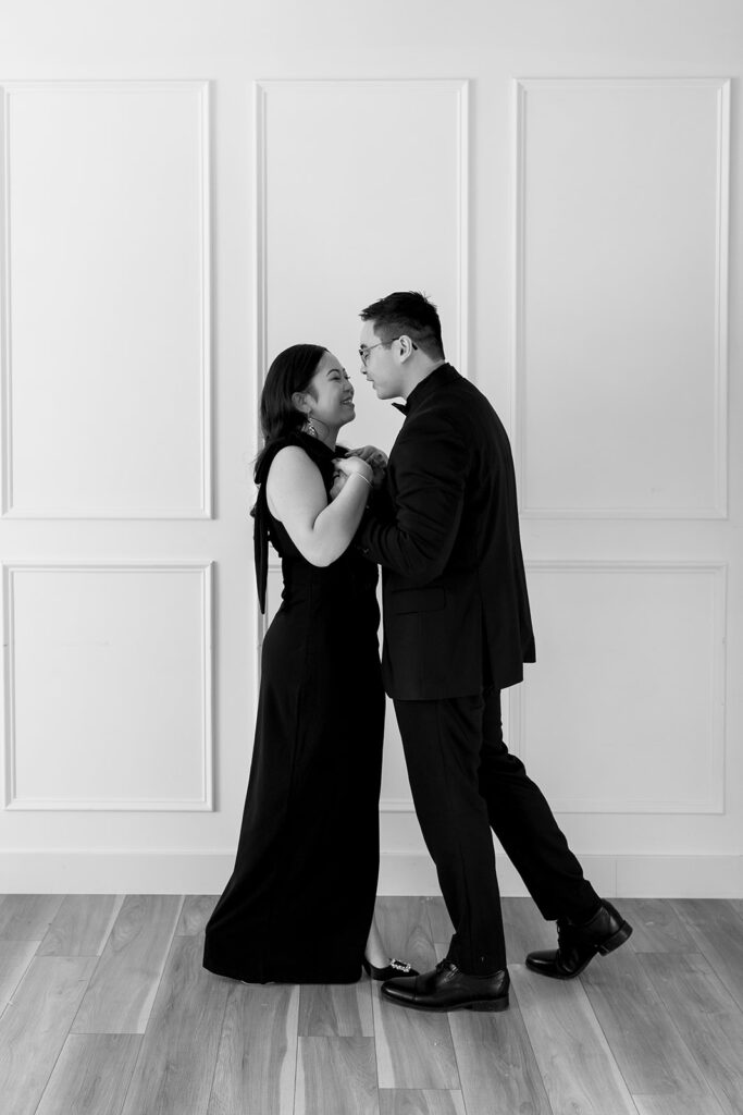 A soon-to-be-married couple capturing timeless portraits in a Washington studio.
