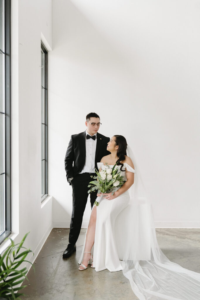 A soon-to-be-married couple capturing timeless portraits in a Washington studio.
