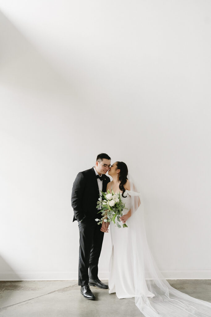 A soon-to-be-married couple capturing timeless portraits in a Washington studio.
