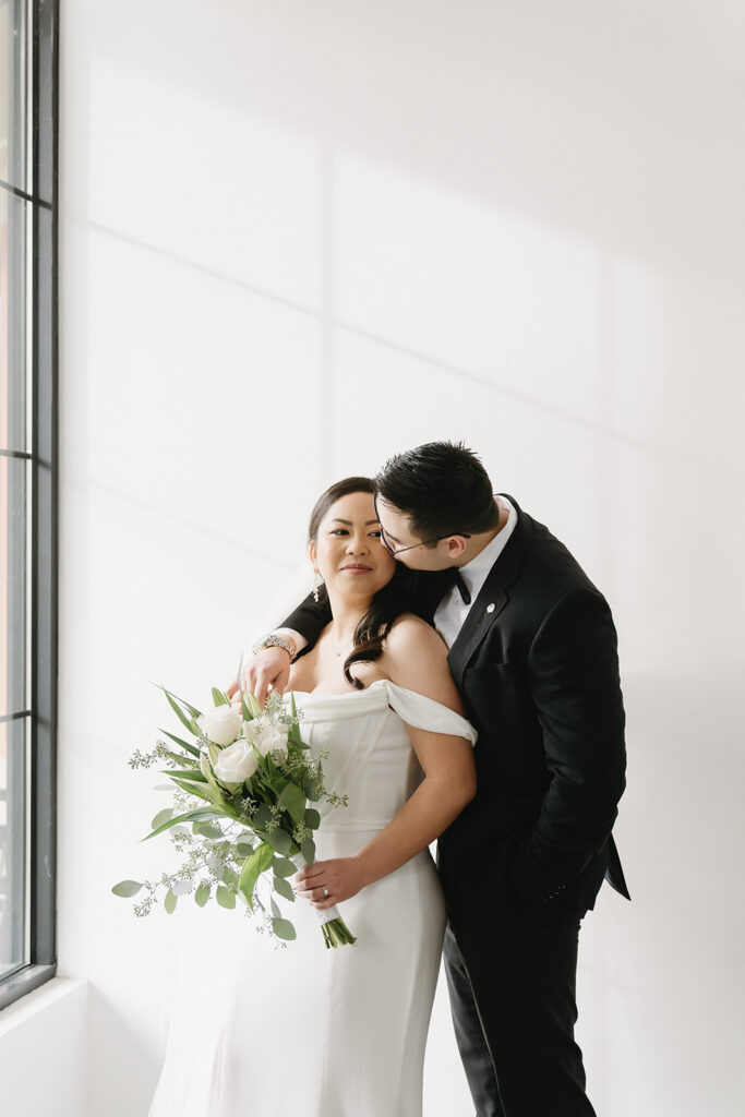 A soon-to-be-married couple capturing timeless portraits in a Washington studio.
