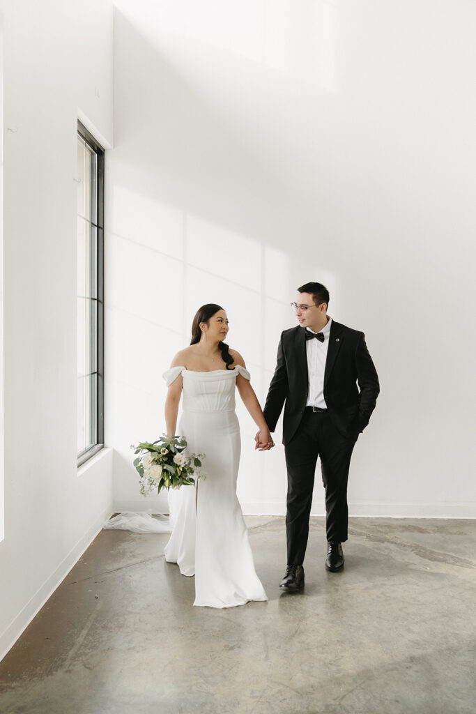 A couple sharing sweet moments during their pre-wedding photo session in a Washington studio.
