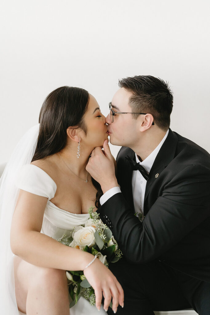 A couple sharing sweet moments during their pre-wedding photo session in a Washington studio.
