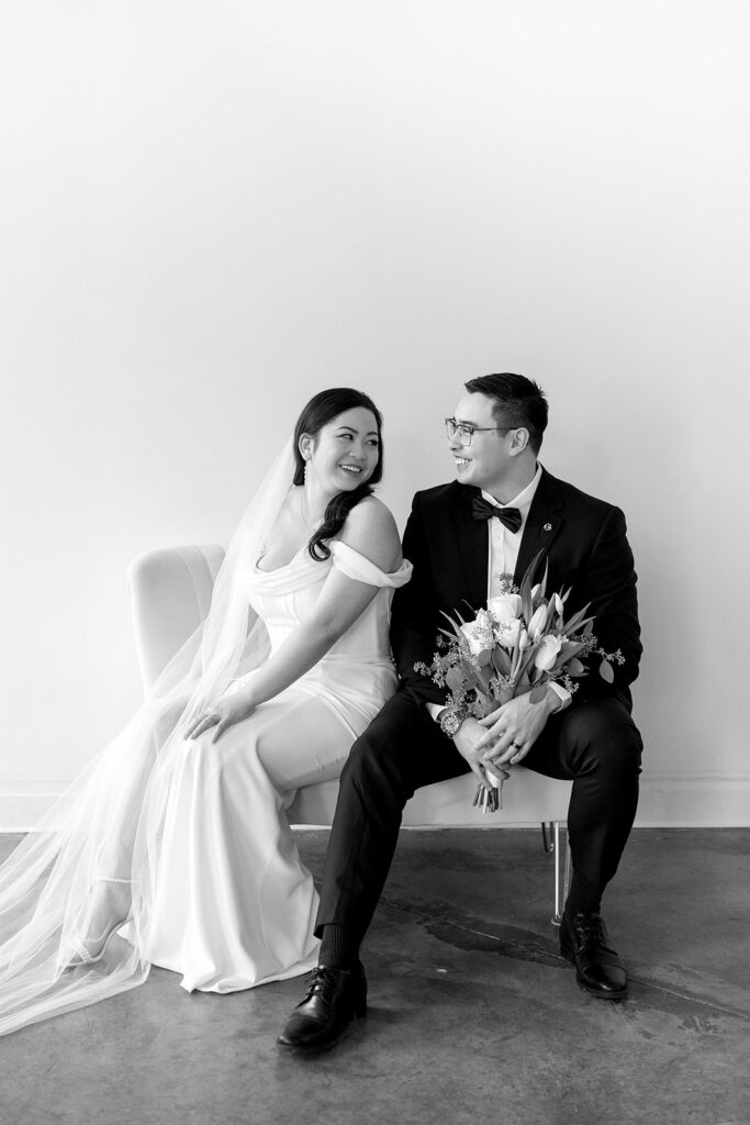 A couple sharing sweet moments during their pre-wedding photo session in a Washington studio.
