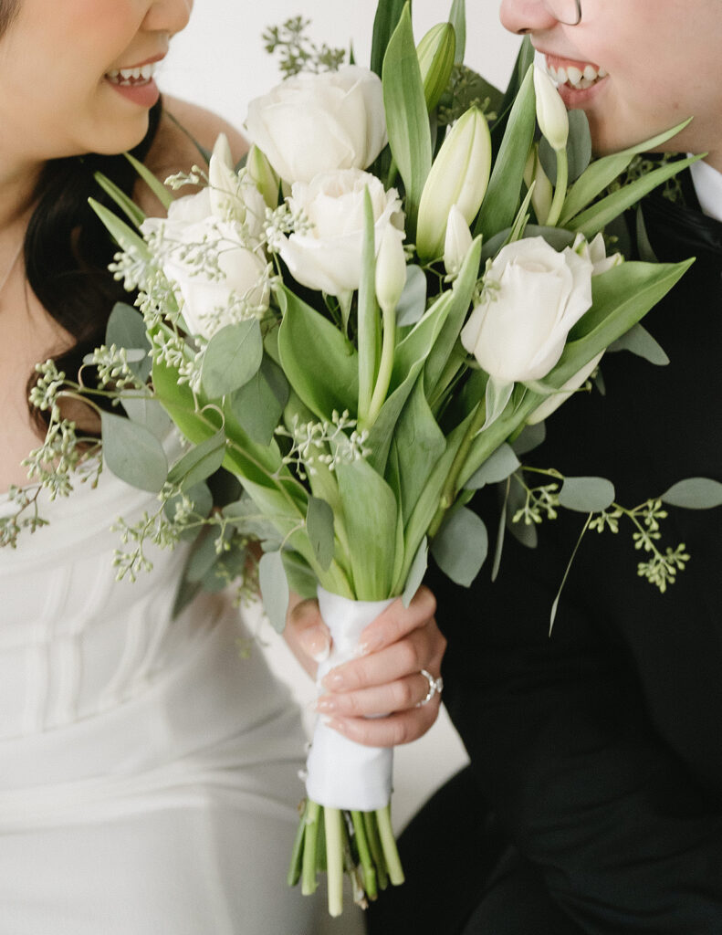 A couple posing in a studio in Washington for elegant and classic pre-wedding photos.
