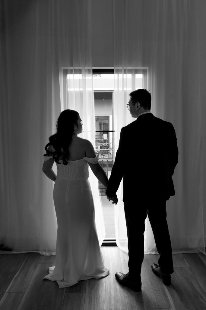 A couple posing in a studio in Washington for elegant and classic pre-wedding photos.
