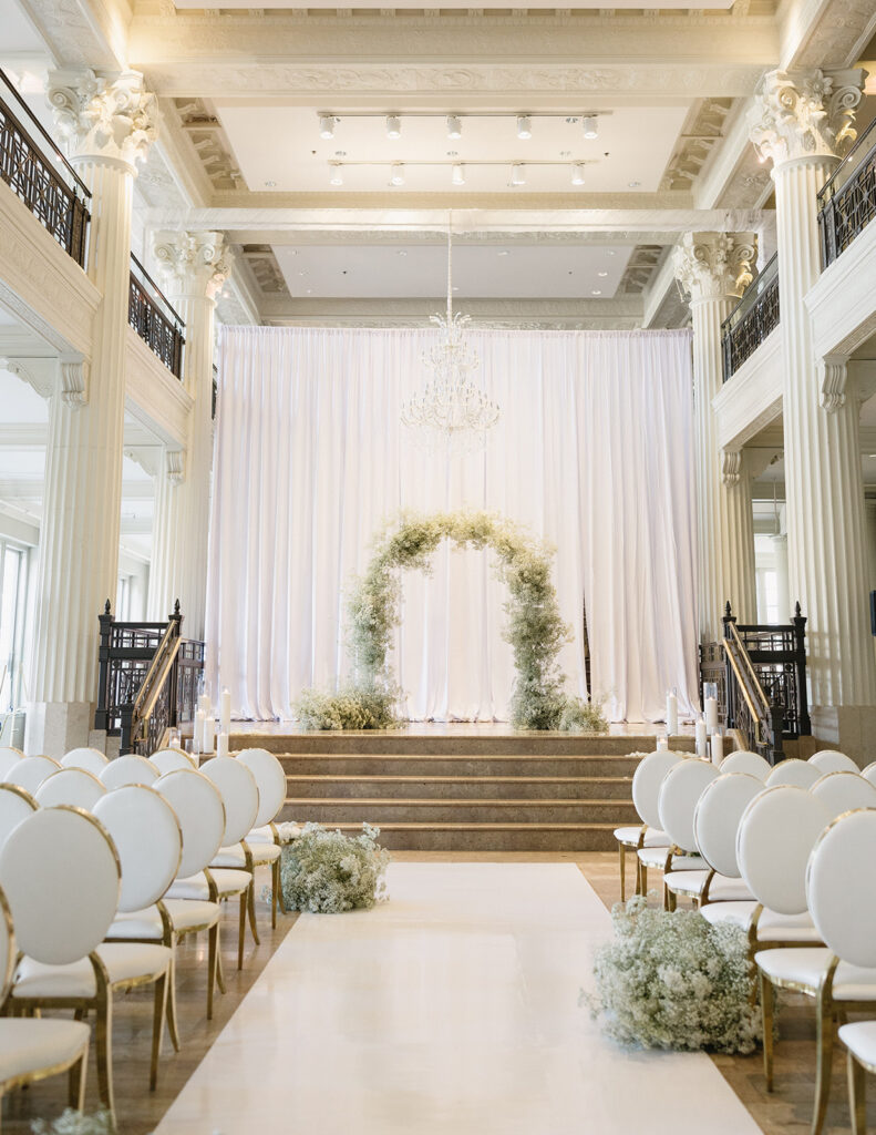 A sophisticated Houston wedding showcasing minimal yet stunning decor and classic wedding portraits.
