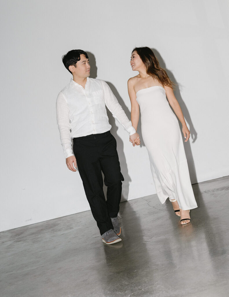 a couple posing for their romantic engagement photos
