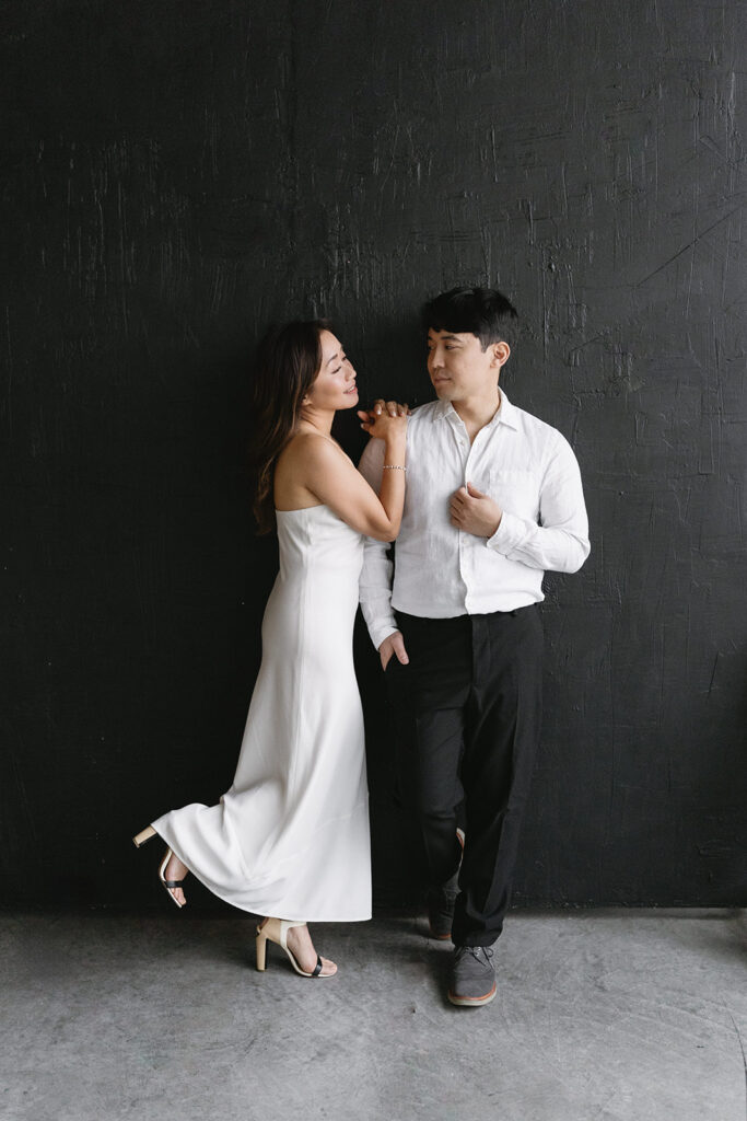 a couple posing for their romantic engagement photos
