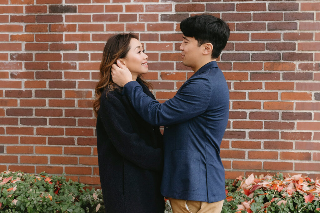 a couple posing for their romantic engagement photos
