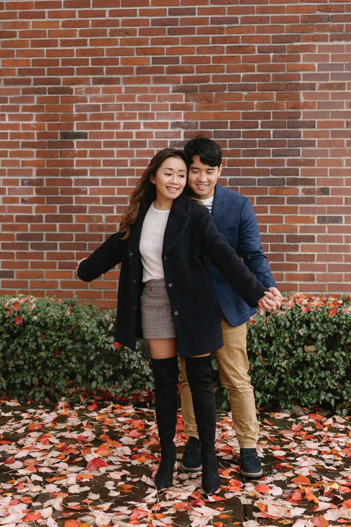 a couple posing for their romantic engagement photos
