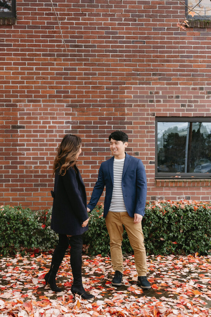 a couple posing for their romantic engagement photos
