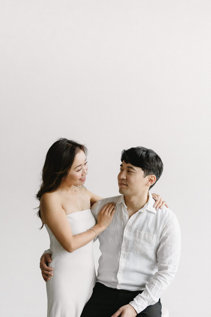 a couple posing for their romantic engagement photos
