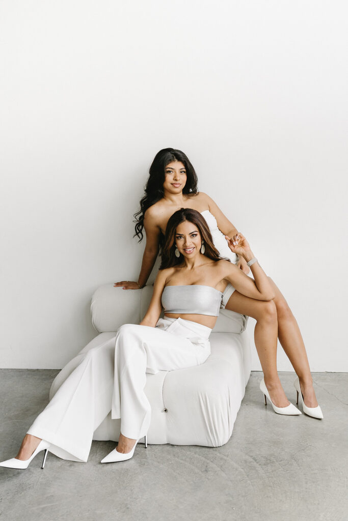 Modern family portrait with editorial styling and minimal backdrop
