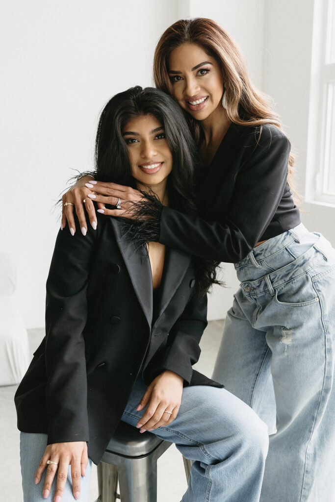 Modern family portrait with editorial styling and minimal backdrop
