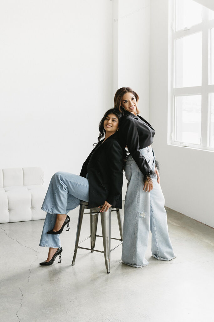 Modern family portrait with editorial styling and minimal backdrop
