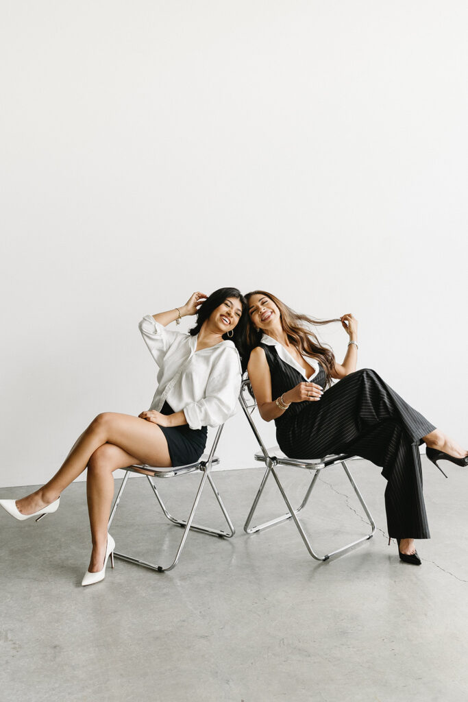 Modern family portrait with editorial styling and minimal backdrop
