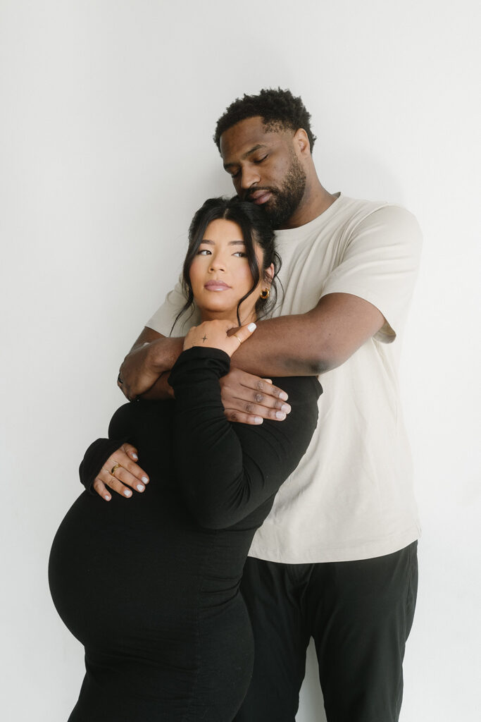 Couple posing together during an intimate maternity session-aesthetic maternity shoot

