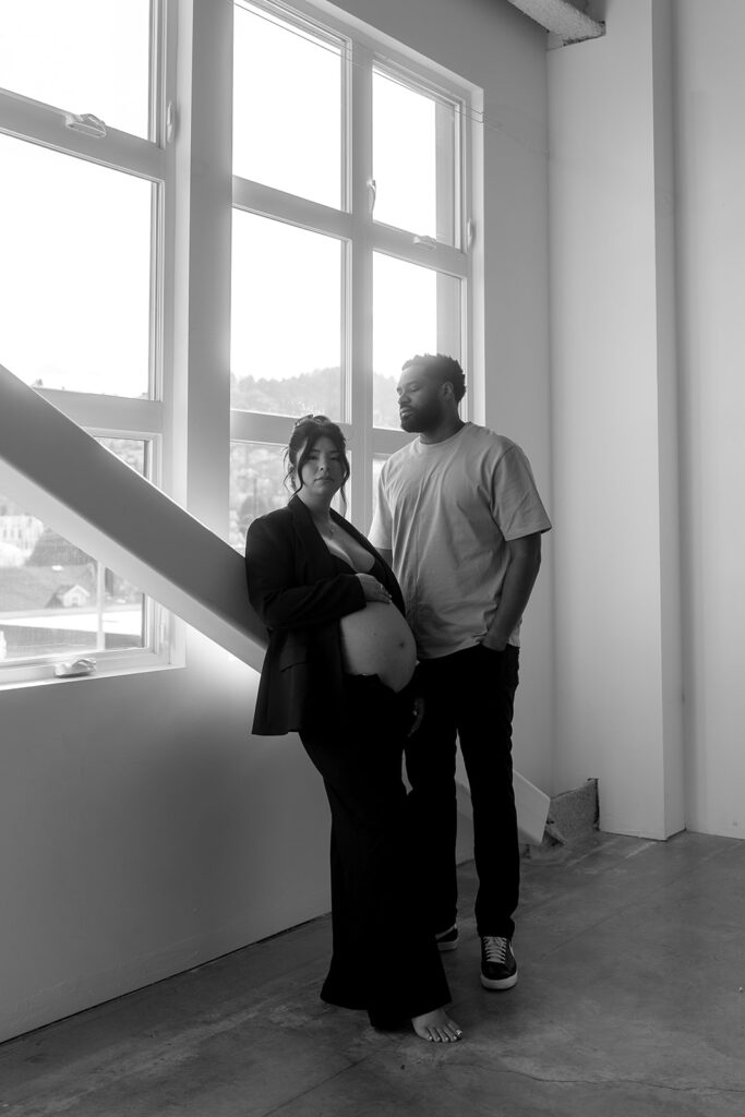 Couple posing together during an intimate maternity session-aesthetic maternity shoot
