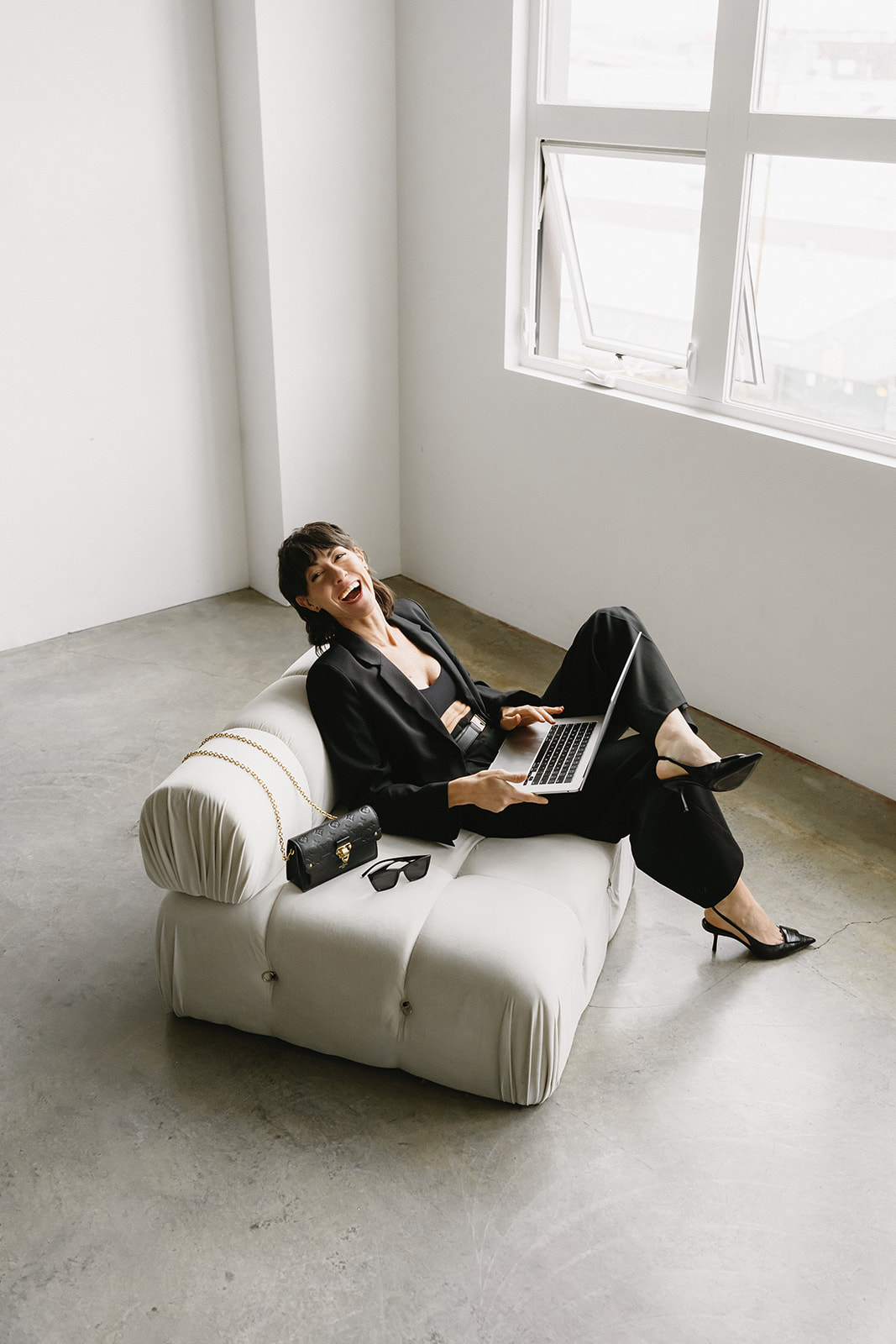 Entrepreneur posing for branding photos at Cream Creative Studio