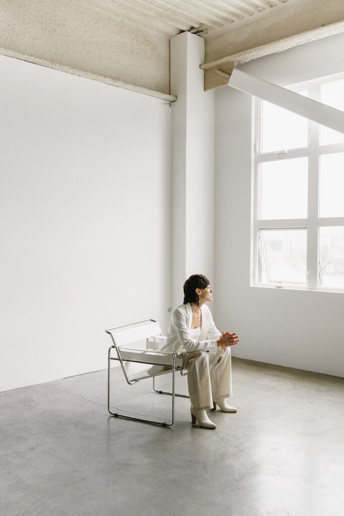 Entrepreneur posing for branding photos at Cream Creative Studio
