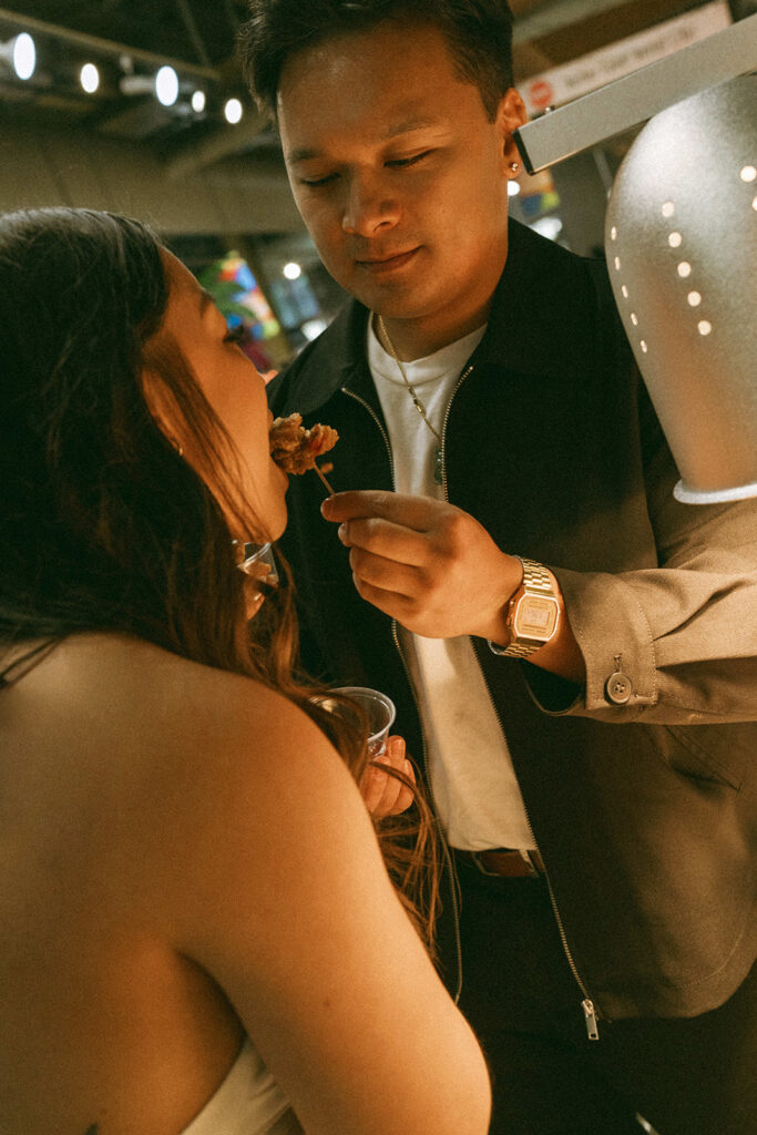 A candid moment captured during a casual engagement photo session.

