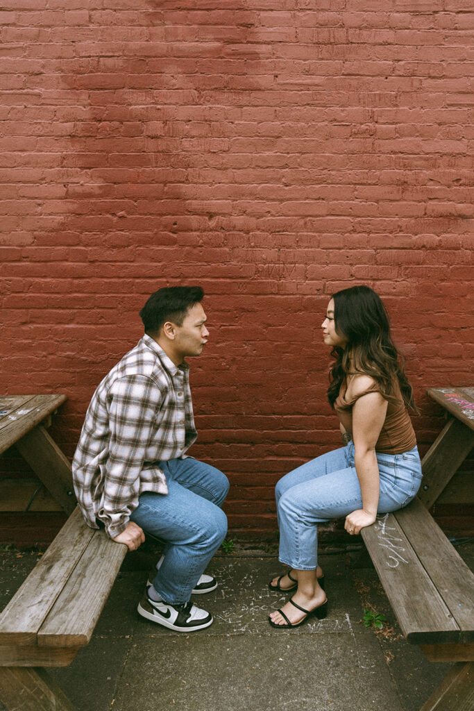 A couple enjoying a relaxed and natural photoshoot in portland.

