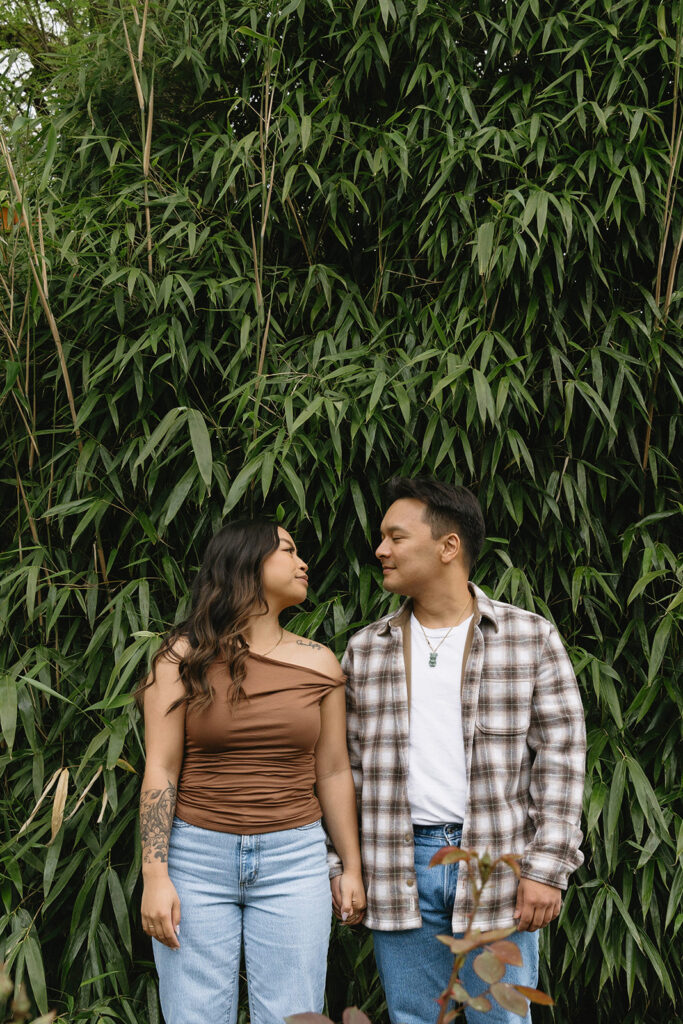 A candid moment captured during a casual engagement photo session.
