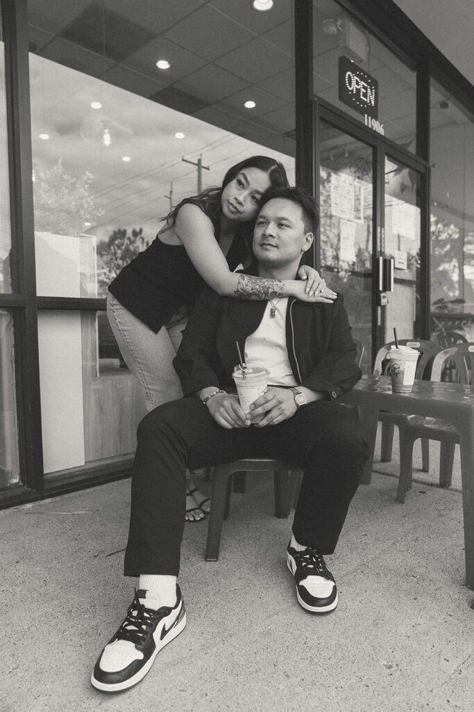 A candid moment captured during a casual engagement photo session.
