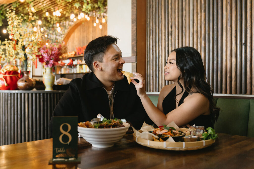 A candid moment captured during a casual engagement photo session.
