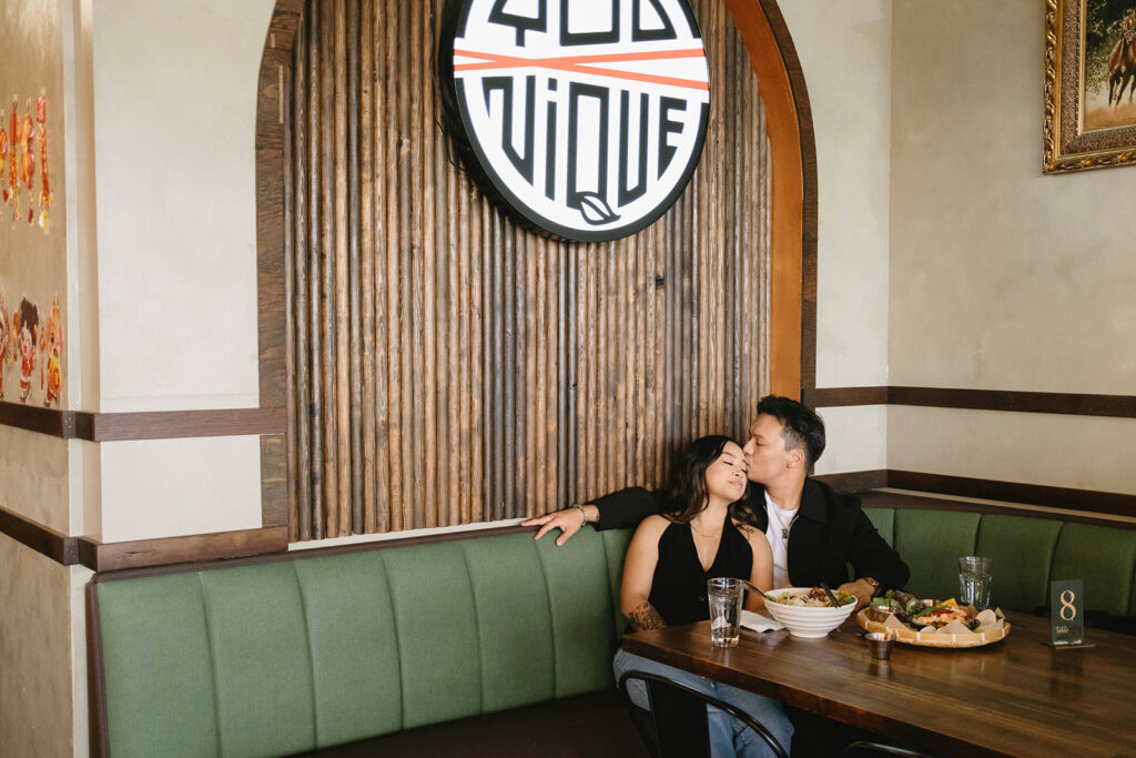 A candid moment captured during a casual engagement photo session.
