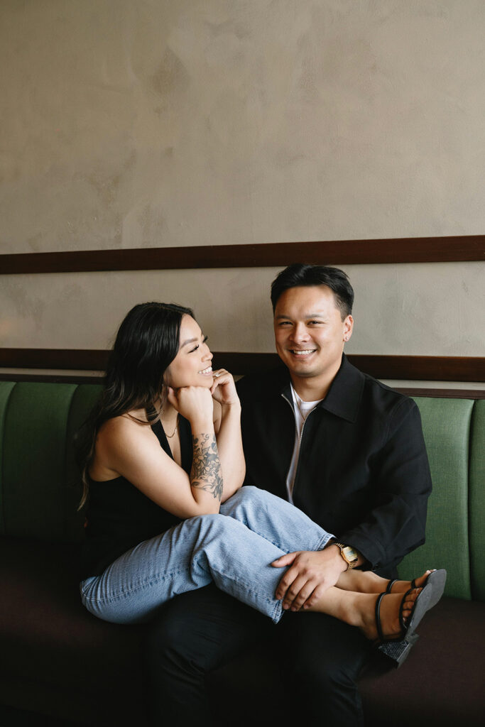 A couple enjoying a relaxed and natural photoshoot in portland.
