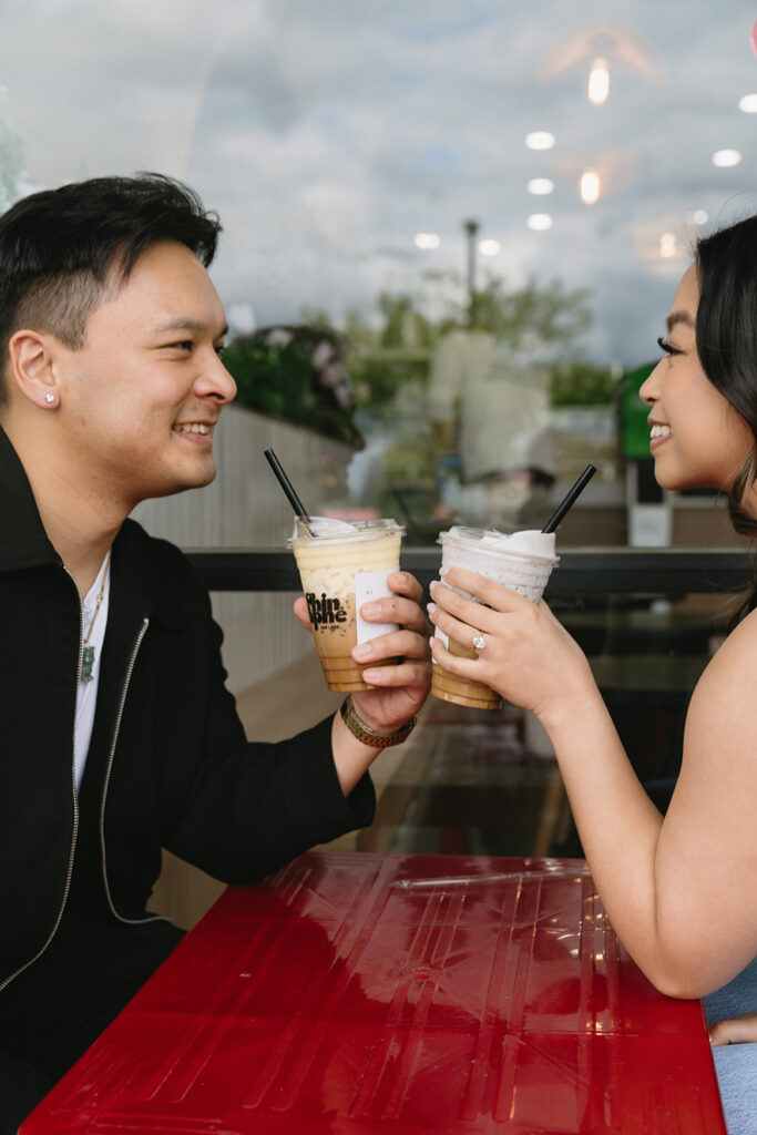 A couple enjoying a relaxed and natural photoshoot in portland.
