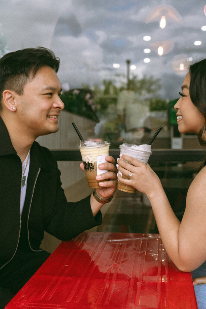 A candid moment captured during a casual engagement photo session.
