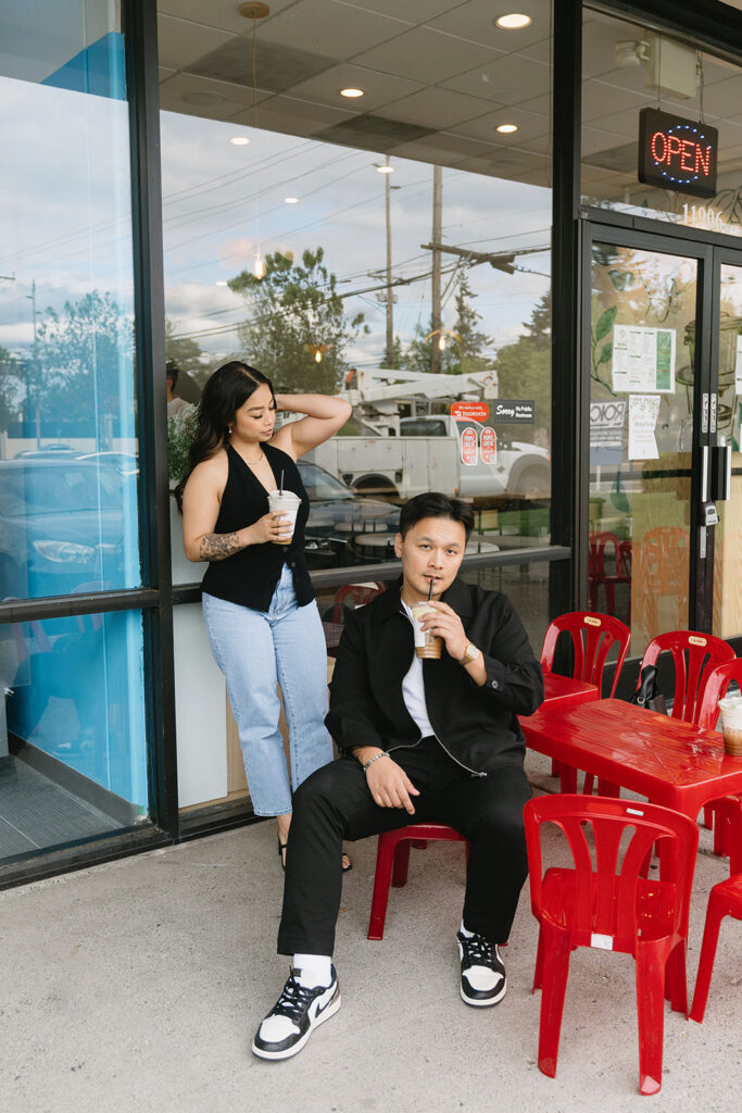 A candid moment captured during a casual engagement photo session.
