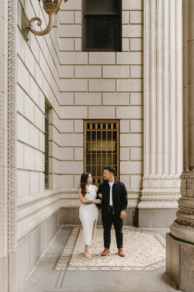 A candid moment captured during a casual engagement photo session.
