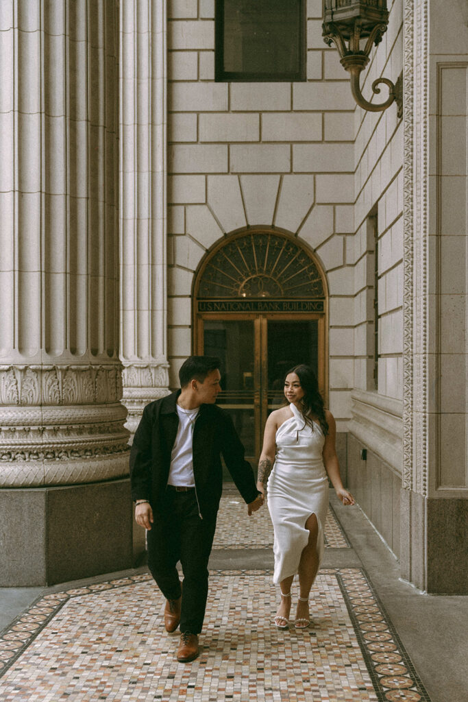 A candid moment captured during a casual engagement photo session.
