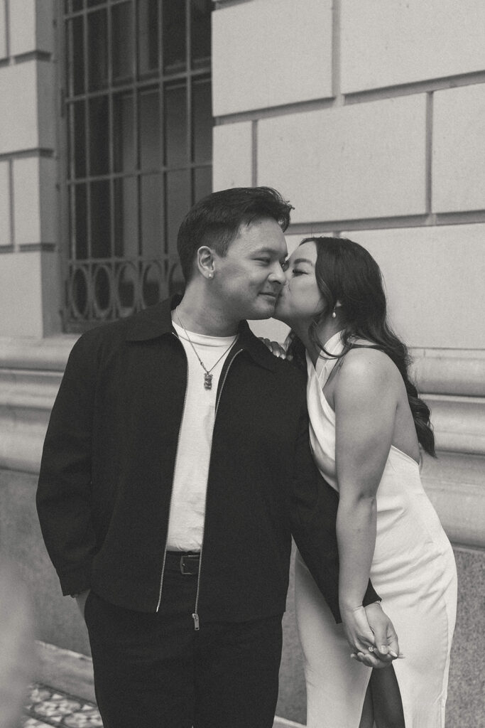 A candid moment captured during a casual engagement photo session.
