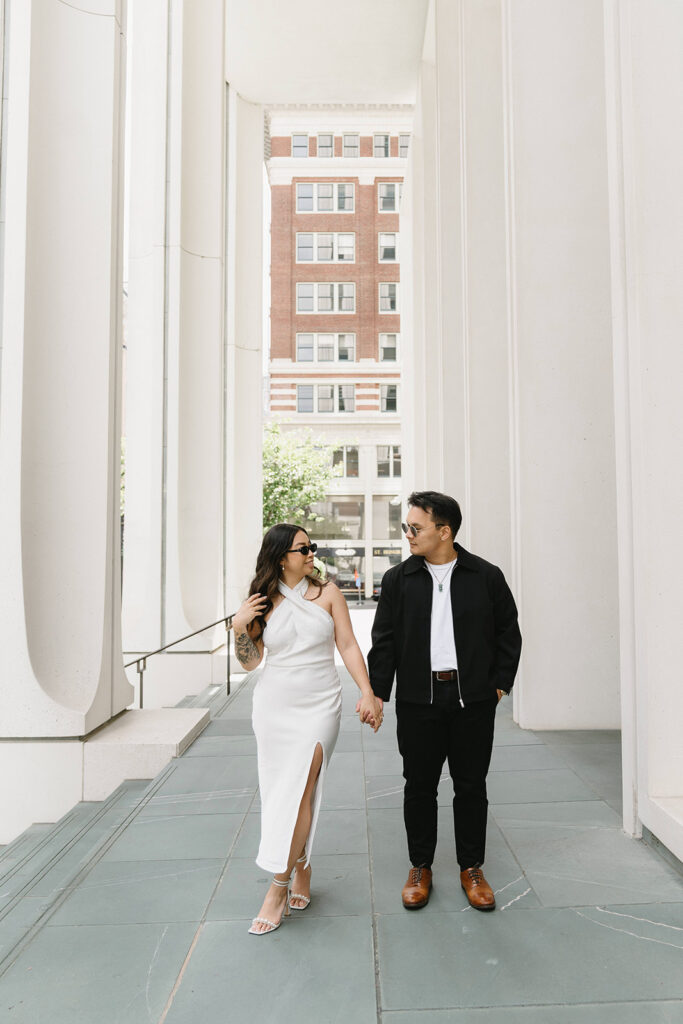 A candid moment captured during a casual engagement photo session.
