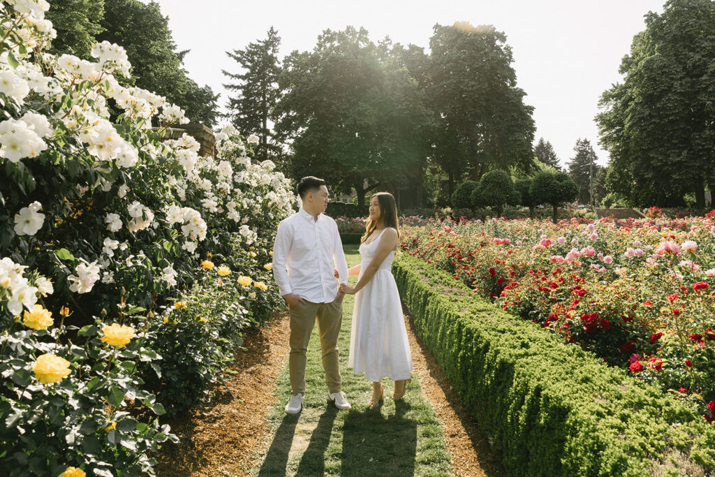 Engagement portraits captured in a Portland rose garden in full bloom.

