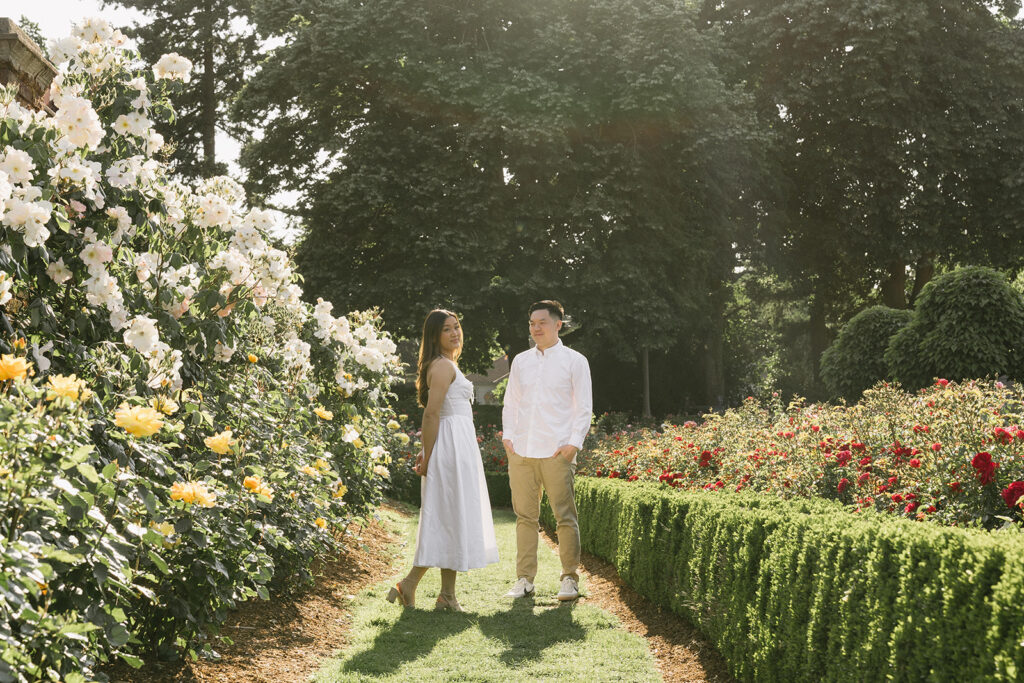 Engagement portraits captured in a Portland rose garden in full bloom.
