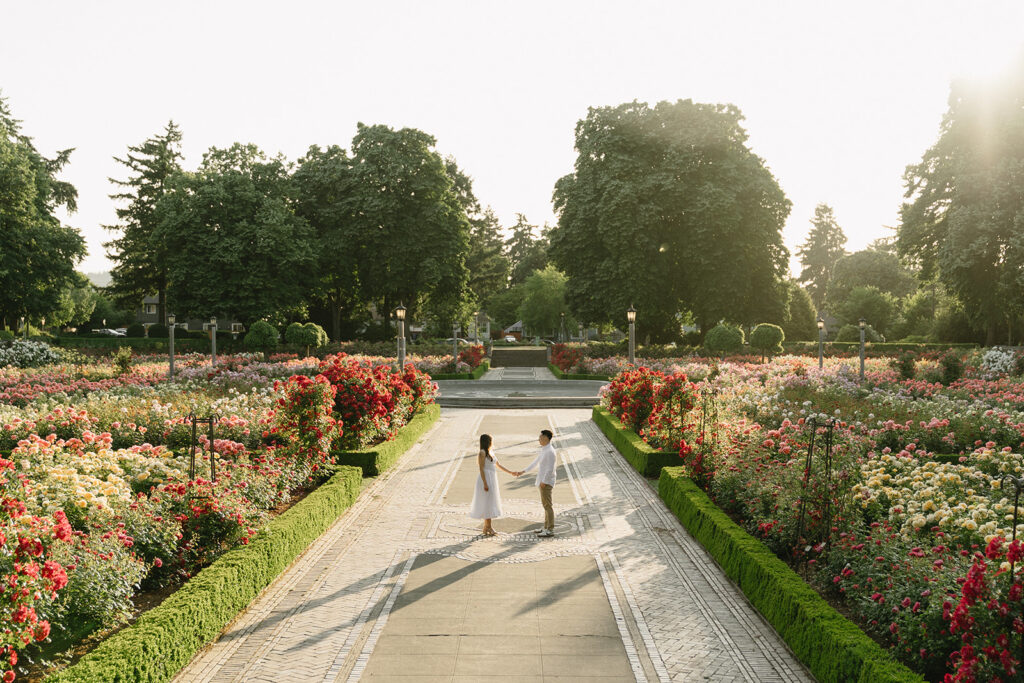 Engagement portraits captured in a Portland rose garden in full bloom.
