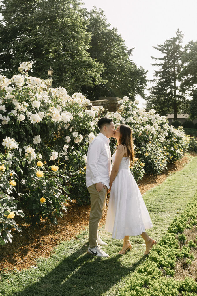 Engagement portraits captured in a Portland rose garden in full bloom.
