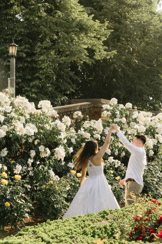 Engagement portraits captured in a Portland rose garden in full bloom.
