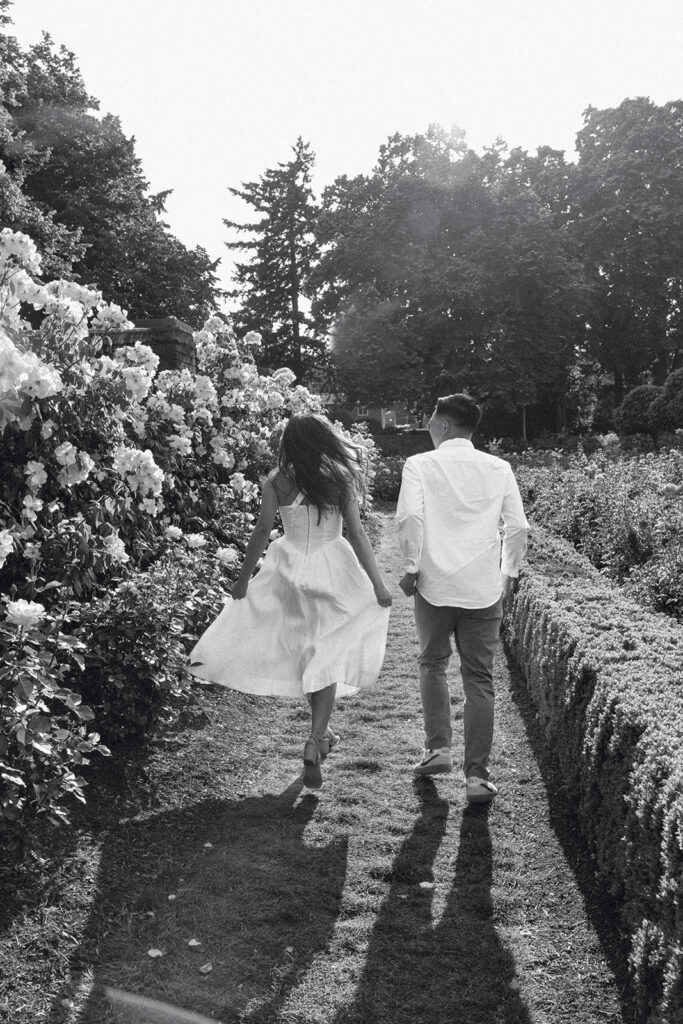 Engagement portraits captured in a Portland rose garden in full bloom.
