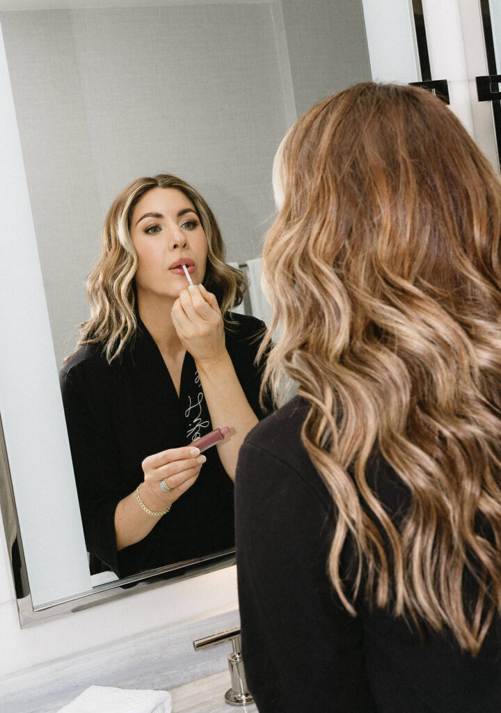Woman posing for a personal branding shoot at a luxury hotel
