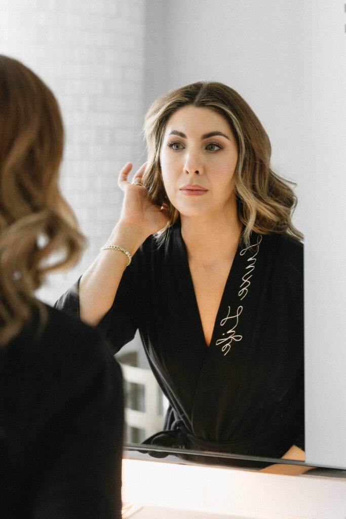 Woman posing for a personal branding shoot at a luxury hotel
