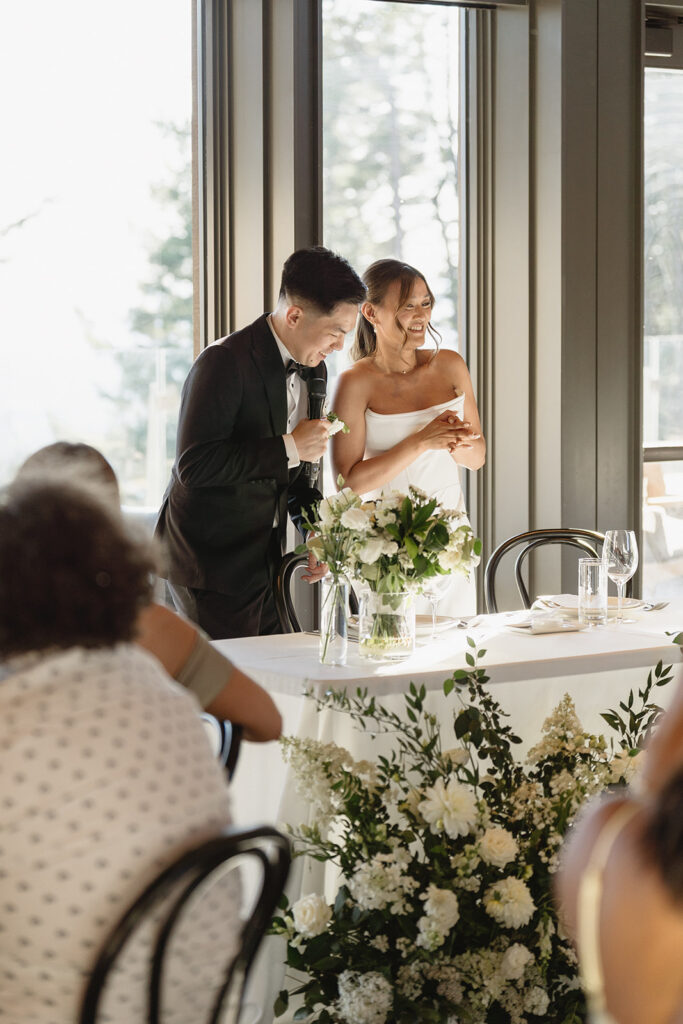 Wedding guests celebrating at Amaterra Winery surrounded by modern architecture and scenic views.
