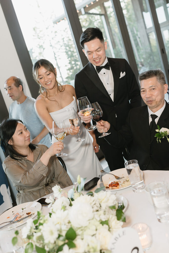 Timeless wedding reception design with neutral decor and glowing candlelight.
