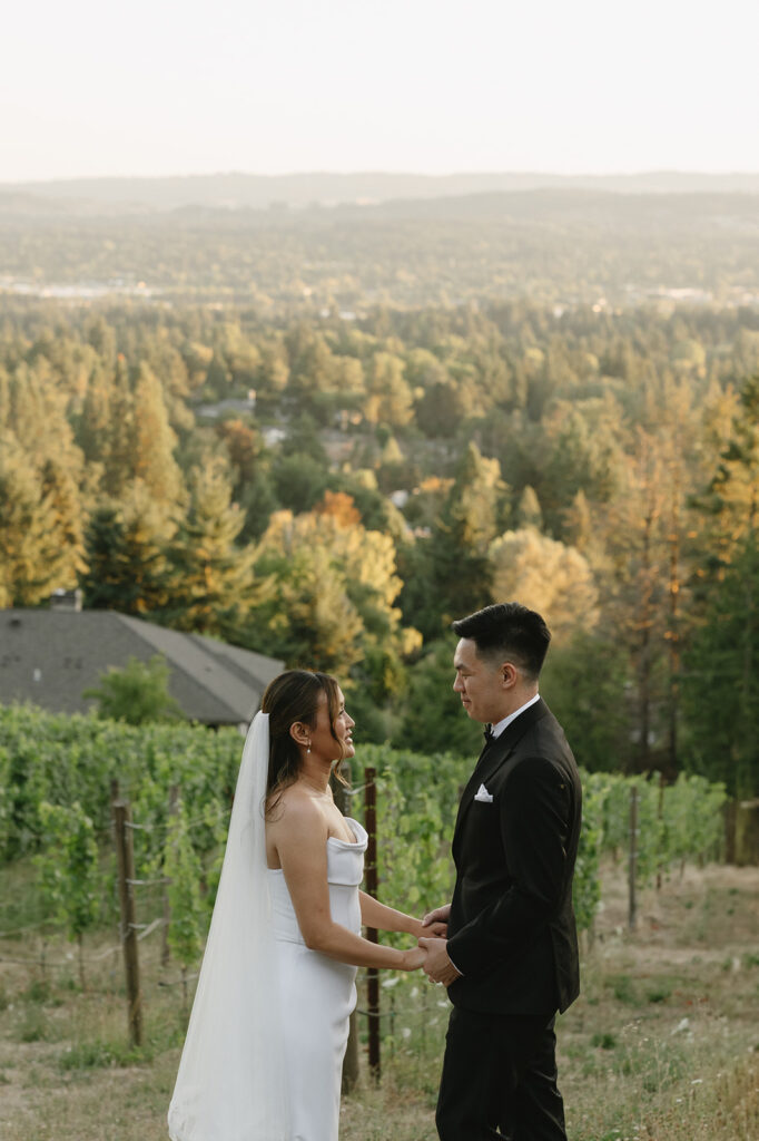 Bride and groom sharing a quiet moment at Amaterra Winery overlooking the vineyards.
