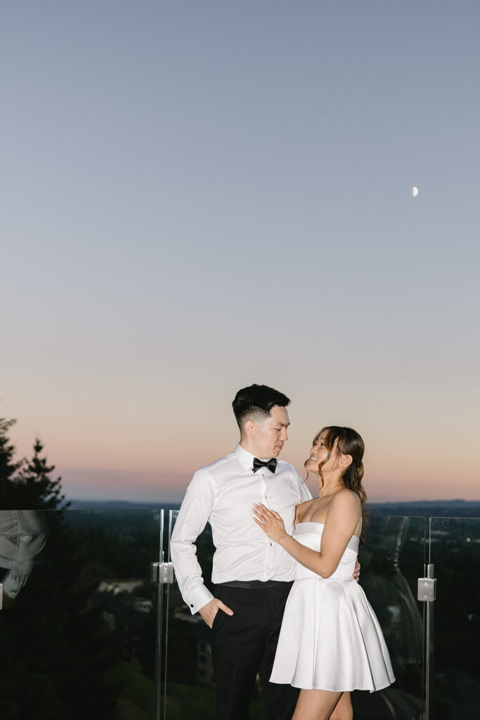 Bride and groom sharing a quiet moment at Amaterra Winery overlooking the vineyards.
